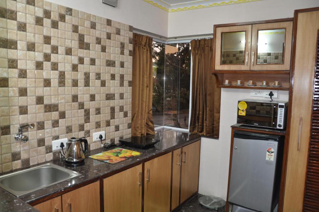 Astoria Residency Hotell Ooty Rum bild